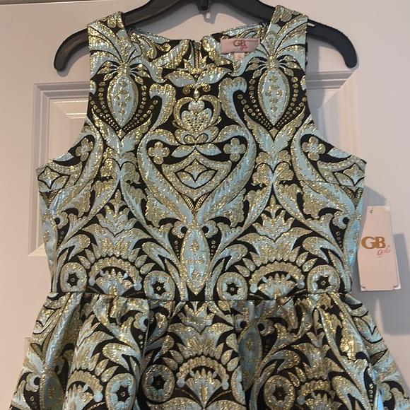 Brand-new with the tech girls dress size 12 brocade fabric with black lining. - Picture 3 of 9